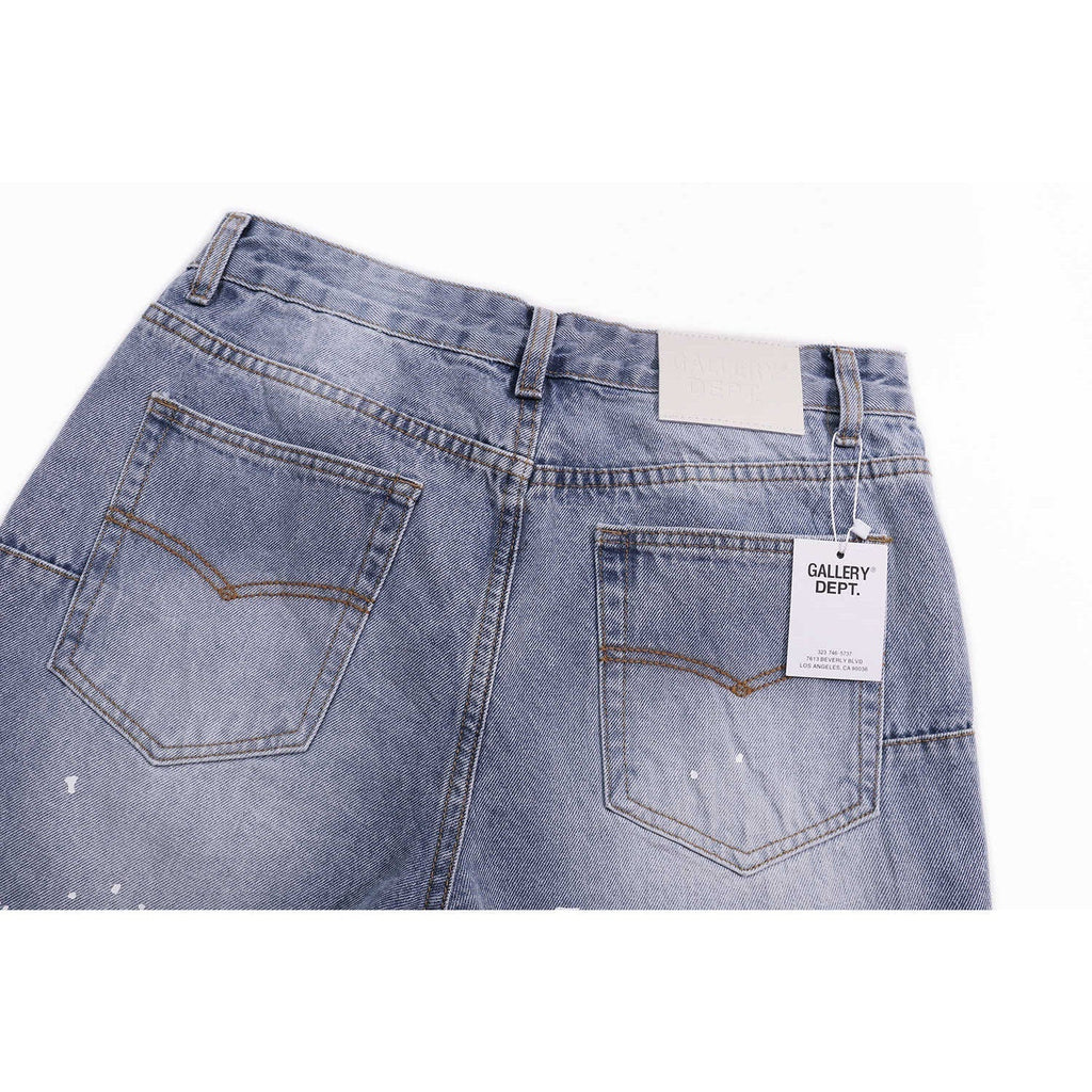 Gallery Dept Jeans with Artistic Ink Splatter and Distressed Flares